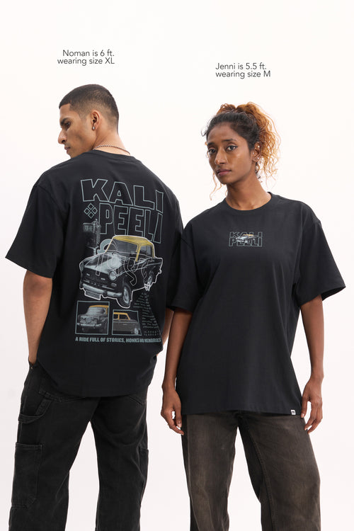 Mitti Kali Peeli Graphic Tee styled on model, full length